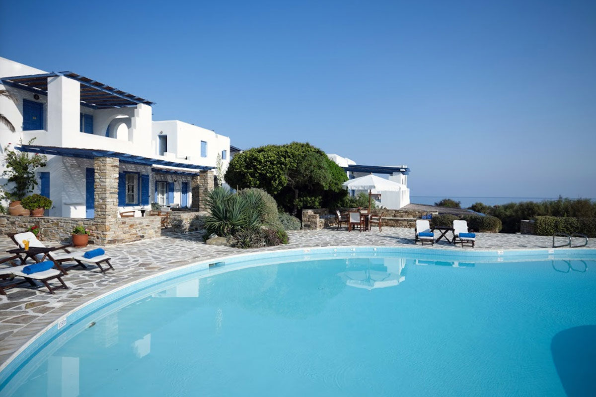 <b>Villa Marandi, Stelida</b> - With leafy beachfront gardens surrounding the property, Villa Marandi draws guests with its white-washed walls, beach loungers and parasols. Inspired by its surroundings, rooms are chic, airy, and have views of the Aegean. Step out onto an (almost) private beach and gaze across to the Old Town.