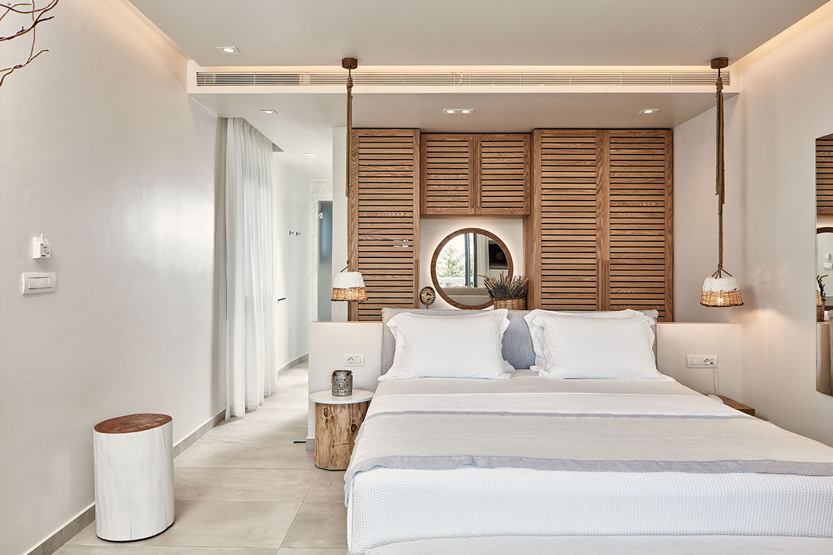 <b>18 Grapes, Agios Prokopios</b> – Within walking distance to Agios Prokopios beach, the 18 Grapes Hotel hints of Cycladic features amidst comfortable design. With a care-free island vibe, yet an attention to detail, this modern resort has everything you need: a two-level pool with lounge decks, sophisticated roof terrace, and the Grape Sunset bar restaurant.