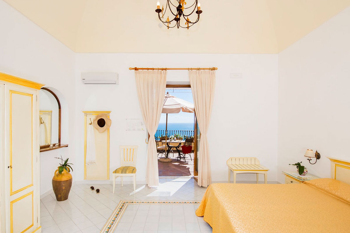 <b>Albergo California, Positano</b> - The views of the pastel-dotted cliffs from this Mediterranean-style boutique hotel are only enhanced when they’re accompanied by breakfast on the terrace overlooking the sea. Albergo California is set up on the hillside and is only a 9-minute walk to the beach.