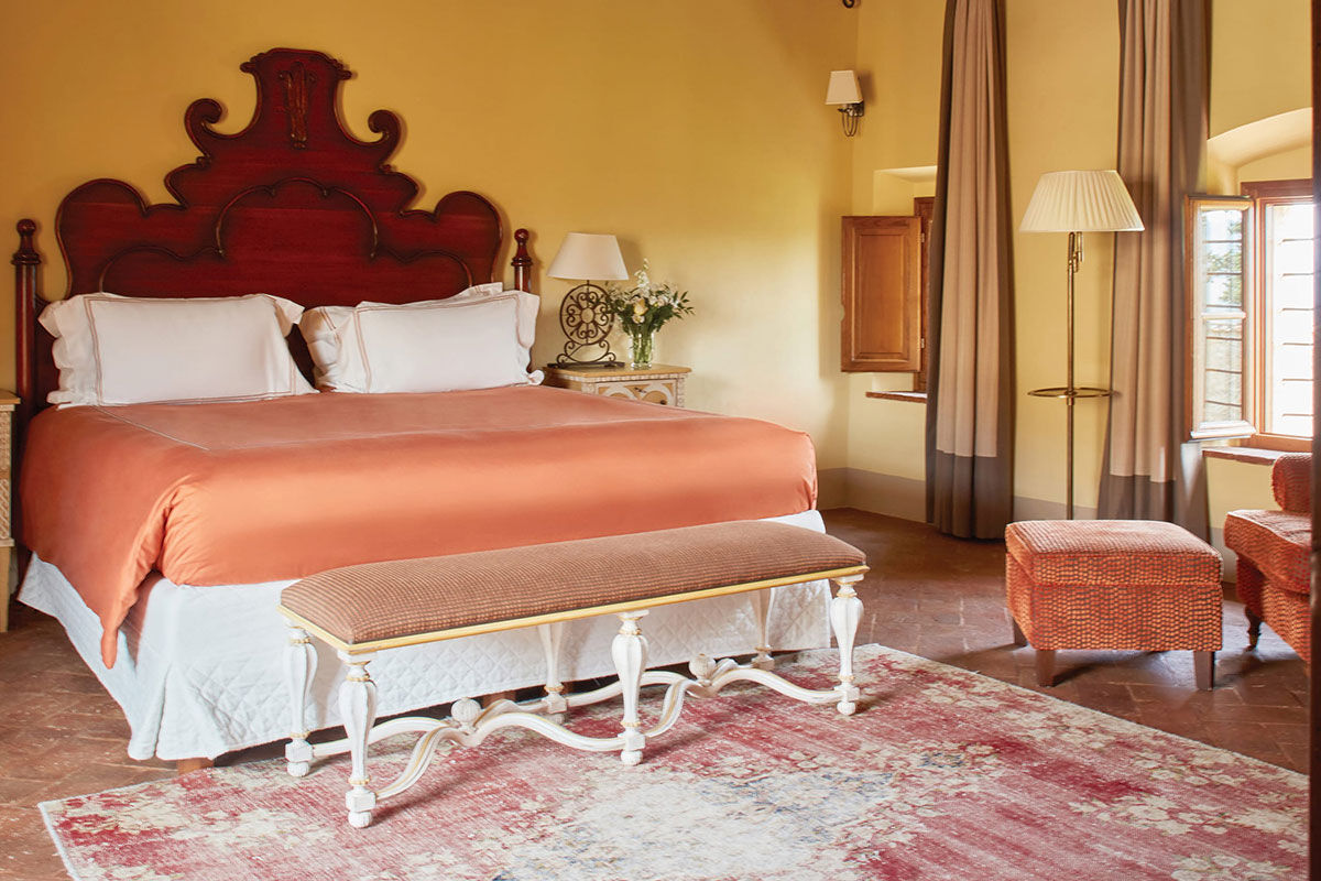 <b>Belmond Castello di Casole</b> - At this 10th century estate, wander the 4,200 acres of golden Tuscan countryside, relax in the wine cellar-turned-spacious spa or enjoy the valley-facing infinity pool. Surrounded by vineyards and olive groves, the Castello di Casole uses its panoramic views to inspire the rich traditional décor within.