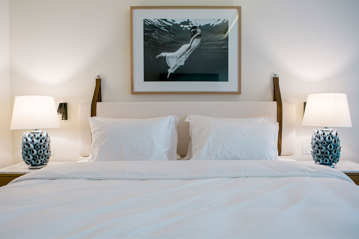 <b>Domes Miramare, a Luxury Collection Resort, Moraitika</b> - Walk along the private white sand beach before heading to the Blue Bar for some pre-dinner drinks at this refined adult-only resort. After that, head over to the raw bar or take a sunset dip in the infinity pool before retreating to your classic upscale room with a view.