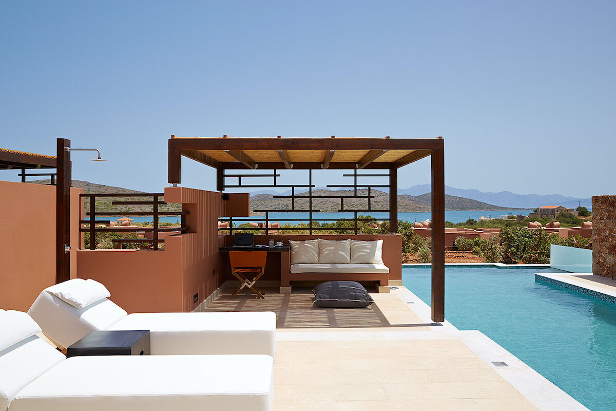 <b>Domes of Elounda, Autograph Collection, Elounda</b> - With views of the Aegean Sea, the newly renovated Domes of Elounda feature sleek, plush rooms as well as four restaurants, four bars, a pool, tennis court and access to a private beach. Mediterranean luxury at its finest.