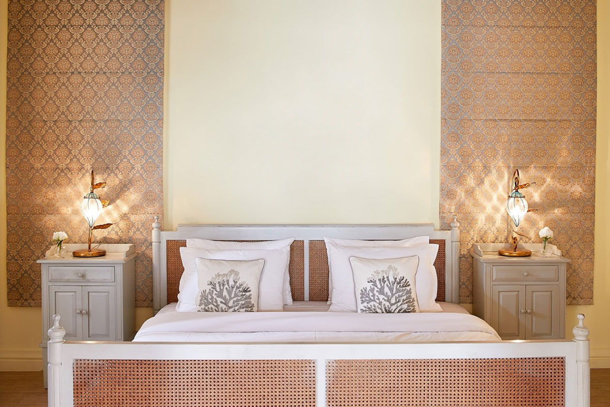 <b>Grecotel Eva Palace, Kommeno</b> - With a private beach and sweeping views of the Ionian Sea and Corfu Town, the Grecotel Eva Palace is a prime location for guests wanting luxury and glam. The rooms are bright, cheery and have an enchanting beach feel.