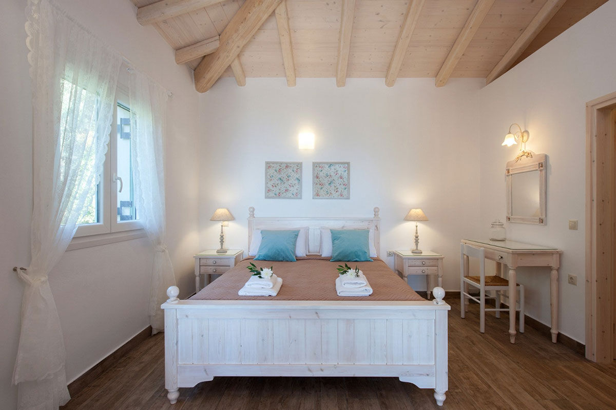 <b>Kaminaki Villas, Nissaki</b> - Conveniently located steps away from the pebble beach that bares the same name, the Kaminaki Villas have a cozy feel that welcomes guests upon arrival. This home-away-from-home has a terrace, pool and outdoor dining area where you can prepare a homemade meal for your family.