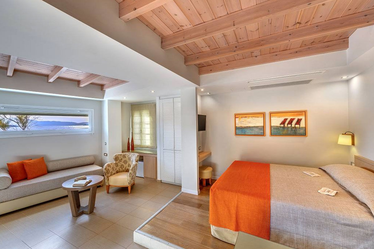 <b>Nissaki, Naxos Town</b> - On the shores of the Mediterranean and facing Saint George Beach, the Nissaki Beach Hotel is a 10-minute walk to the Archaeological Museum of Naxos, and 15-minutes’ walk to the ancient Puerta de Apolo monument. Head to the beachfront restaurant for a relaxed seafood dinner, or head to the poolside bar for funky cocktails.