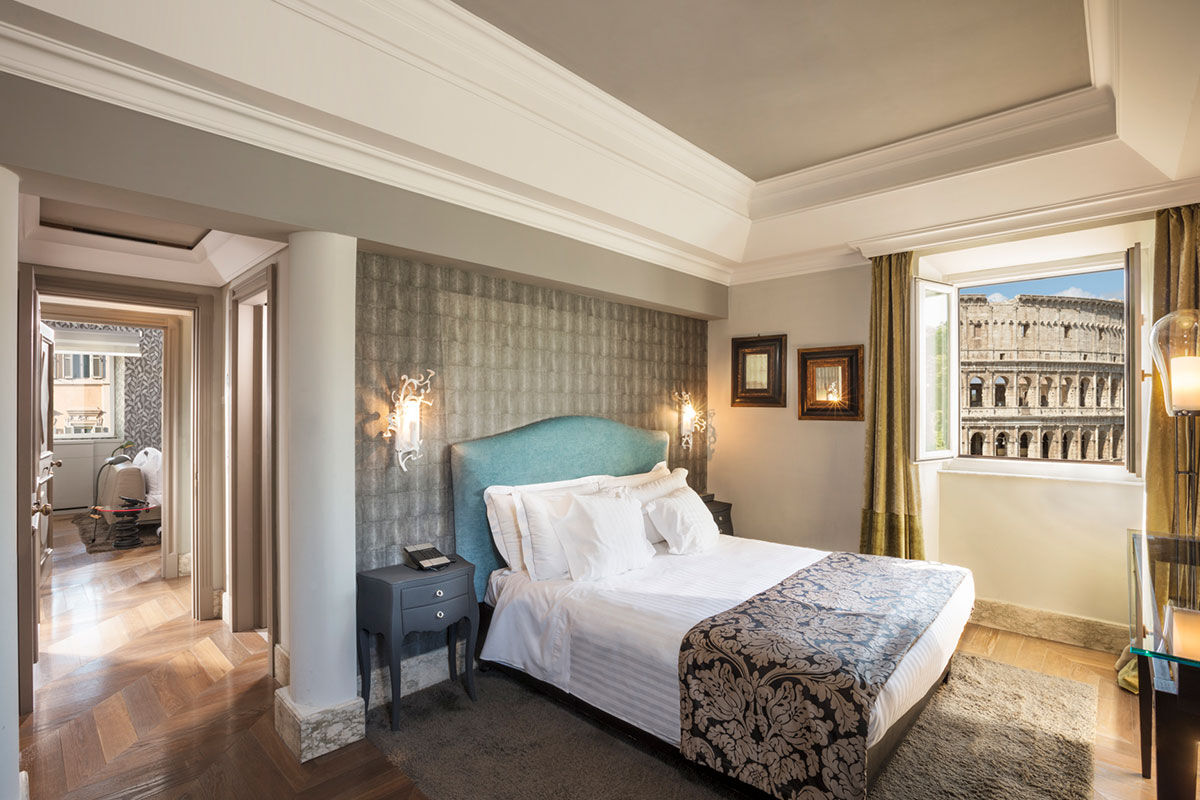 <b>Palazzo Manfredi</b> - Experience Rome with arguably the best views of the Colosseum in the city: Palazzo Manfredi. This boutique hotel is situated next to an ancient gladiator training school and maintains original 16th century marble floors; the atmosphere is modern and luxe with a newly renovated rooftop restaurant.