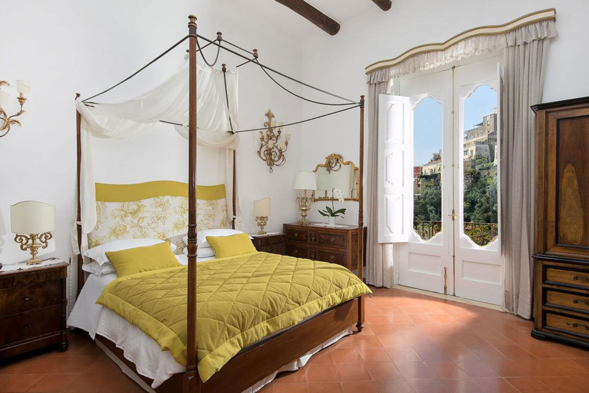 <b>Palazzo Murat, Positano</b> - A patrician residence with a secret garden to explore, this 18th century palazzo serves as an oasis right in the center of Positano. Palazzo Murat has a certain glamorous charm with its shaded terraces, canvas parasols, and sun loungers by the pool.