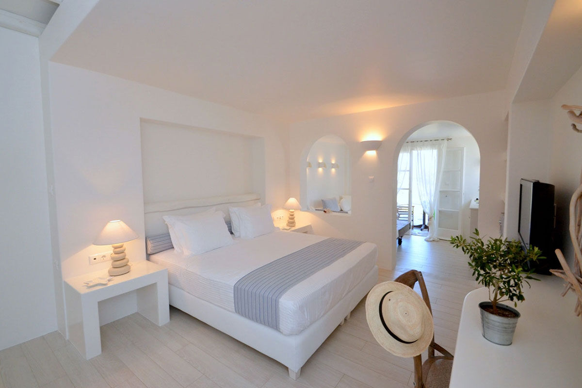 <b>Villa Marandi, Stelida</b> - With leafy beachfront gardens surrounding the property, Villa Marandi draws guests with its white-washed walls, beach loungers and parasols. Inspired by its surroundings, rooms are chic, airy, and have views of the Aegean. Step out onto an (almost) private beach and gaze across to the Old Town.