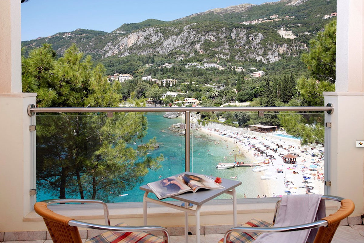<b>Akrotiri Beach, Paleokastritsa</b> - Nestled into the cliff on the edge of the Alipa Marina, Akrotiri Beach Hotel hums with activity: guests relax at the sun terrace bar, swim in the infinity pool and pack their bathing suits for a trip to Agia Triada Beach.