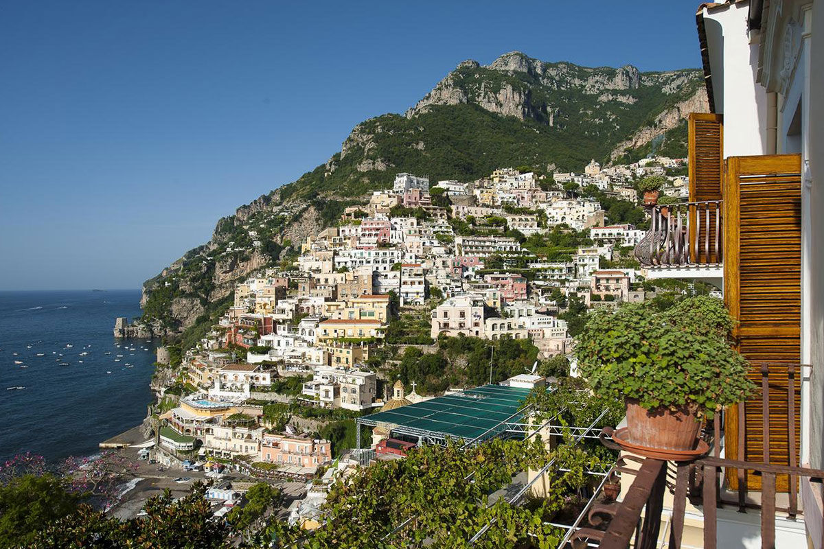 <b>Albergo California, Positano</b> - The views of the pastel-dotted cliffs from this Mediterranean-style boutique hotel are only enhanced when they’re accompanied by breakfast on the terrace overlooking the sea. Albergo California is set up on the hillside and is only a 9-minute walk to the beach.