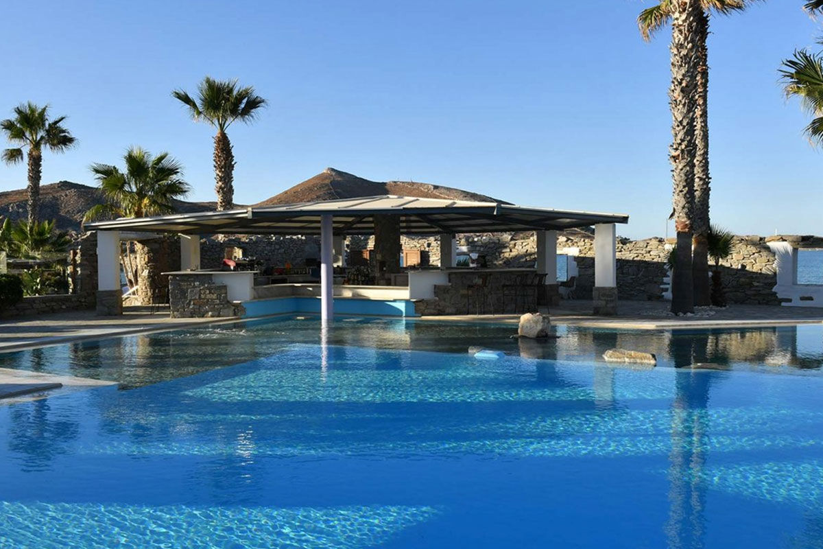 <b>Astir of Paros, Naoussa</b> - Here at Astir of Paros, you can admire the restored 12th century chapel on the grounds, layout on the private beach or spend the morning on the exclusive golf course. The property is surrounded by tropical gardens, making your walk to the beachside pool an aromatic one.