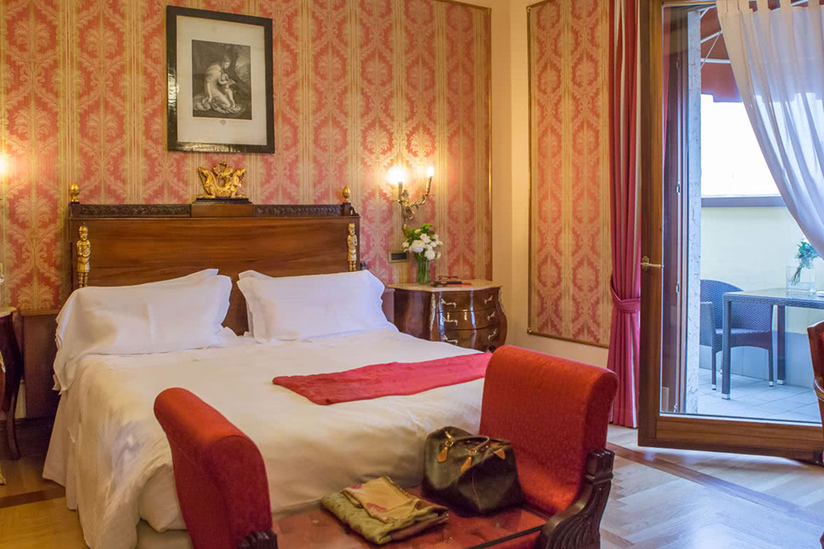 <b>Due Torri Hotel</b> - Just a stone’s throw from Juliet’s famous balcony and located in the historic center of Verona, Due Torri Hotel has an evocative atmosphere of a colorful past. With painted murals on the walls and antiques at every turn, guests are enveloped with history during their stay.