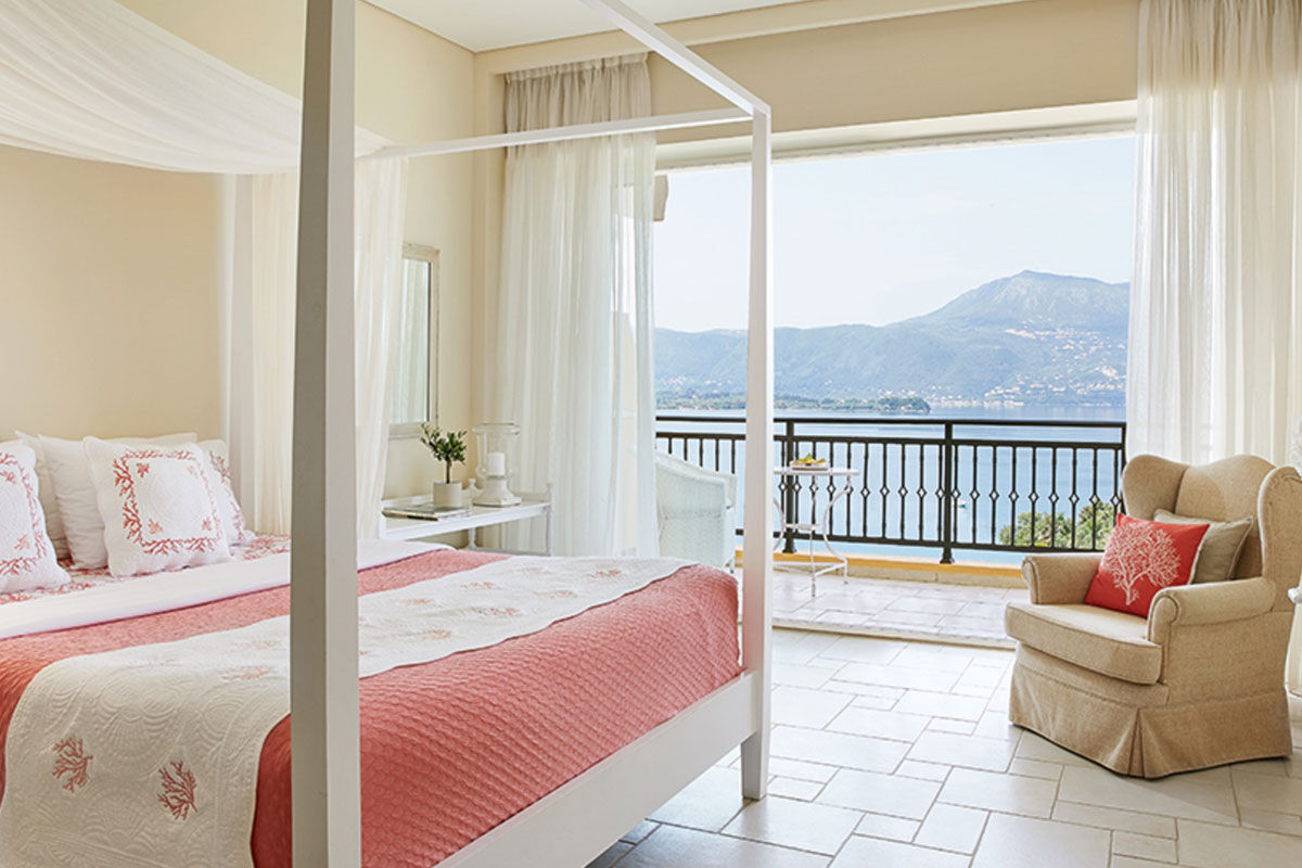 <b>Grecotel Eva Palace, Kommeno</b> - With a private beach and sweeping views of the Ionian Sea and Corfu Town, the Grecotel Eva Palace is a prime location for guests wanting luxury and glam. The rooms are bright, cheery and have an enchanting beach feel.
