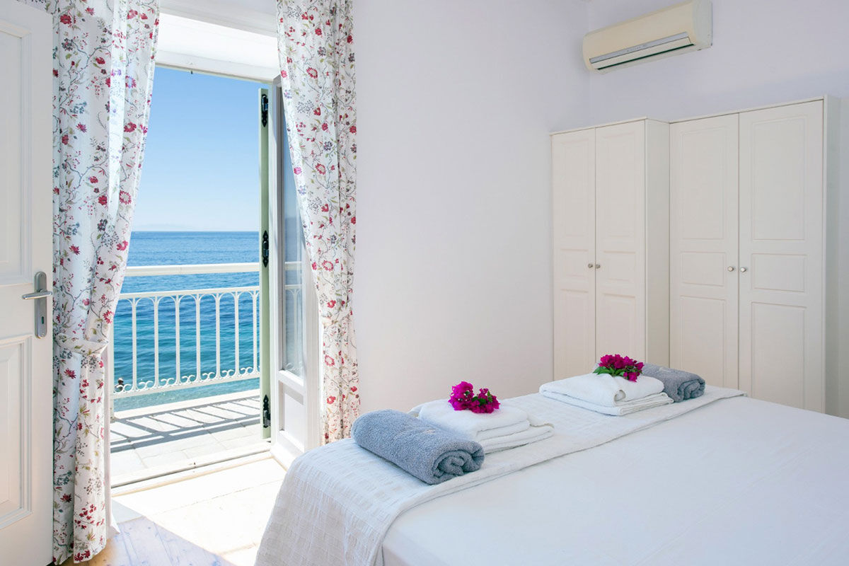 <b>Kaminaki Villas, Nissaki</b> - Conveniently located steps away from the pebble beach that bares the same name, the Kaminaki Villas have a cozy feel that welcomes guests upon arrival. This home-away-from-home has a terrace, pool and outdoor dining area where you can prepare a homemade meal for your family.