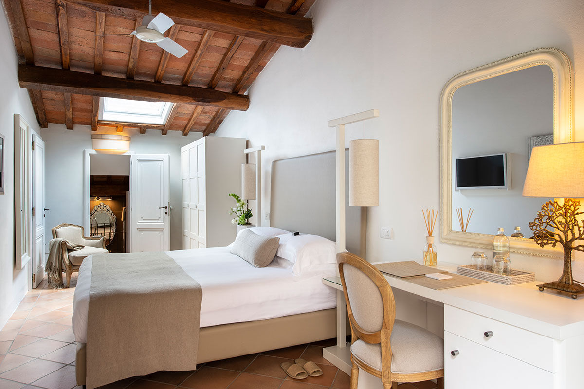 <b>Locanda di Piazze</b> - This stone farmhouse circa 1540 has been transformed into a rustic-chic hotel with surrounding gardens, sundeck and pool with panoramic views. With a high-end regional restaurant on site, there may be no need to venture off the garden terrace at all.