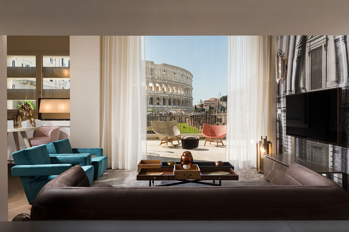 <b>Palazzo Manfredi</b> - Experience Rome with arguably the best views of the Colosseum in the city: Palazzo Manfredi. This boutique hotel is situated next to an ancient gladiator training school and maintains original 16th century marble floors; the atmosphere is modern and luxe with a newly renovated rooftop restaurant.