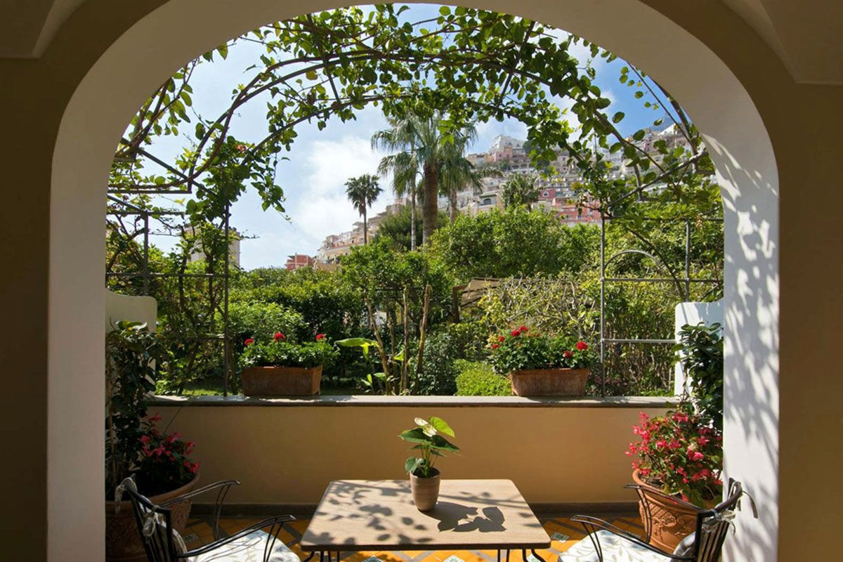 <b>Palazzo Murat, Positano</b> - A patrician residence with a secret garden to explore, this 18th century palazzo serves as an oasis right in the center of Positano. Palazzo Murat has a certain glamorous charm with its shaded terraces, canvas parasols, and sun loungers by the pool.