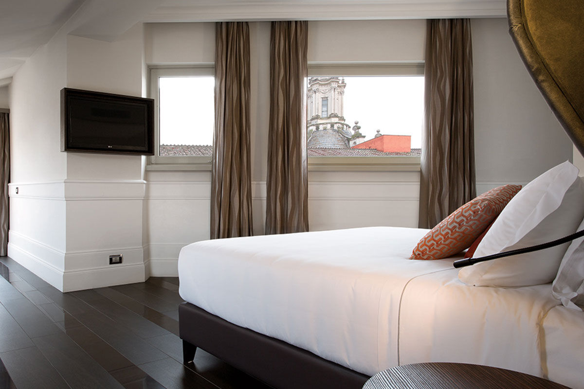 <b>Palazzo Navona</b> - Within the heart of Rome, Palazzo Navona Hotel is just 262ft from the famous square, a 4-minute walk to the Pantheon, and a 9-minute stroll to the Spanish Steps. Sleek and romantic, this intimate hotel has playful trimmings and a stylish rooftop terrace to help you relax after an exciting day of exploring.