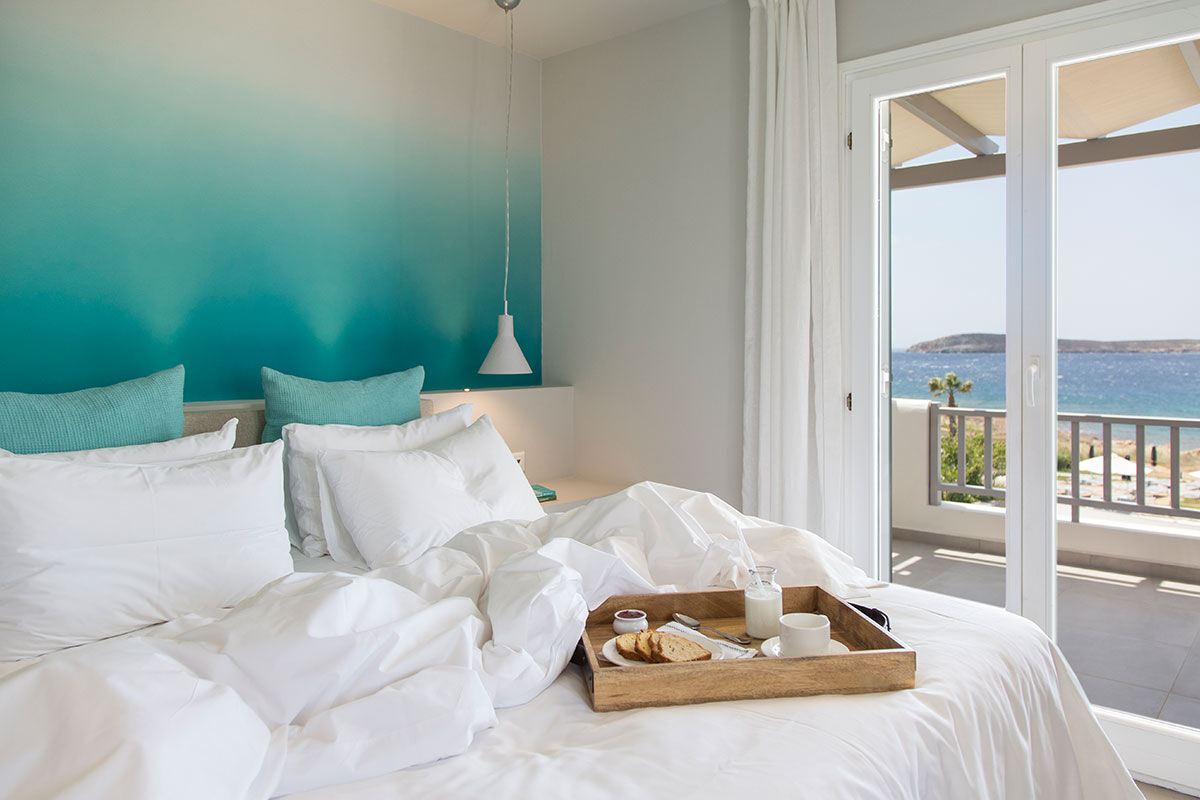 <b>Poseidon of Paros, Golden Beach</b> - Tucked away from busy areas, this upscale hotel on Paros’ southern coast is a dream retreat for the serenity-seeking traveler. With poolside bars and the striking architecture of the Cyclades, this Golden Beach hotel sits on unspoiled beauty.