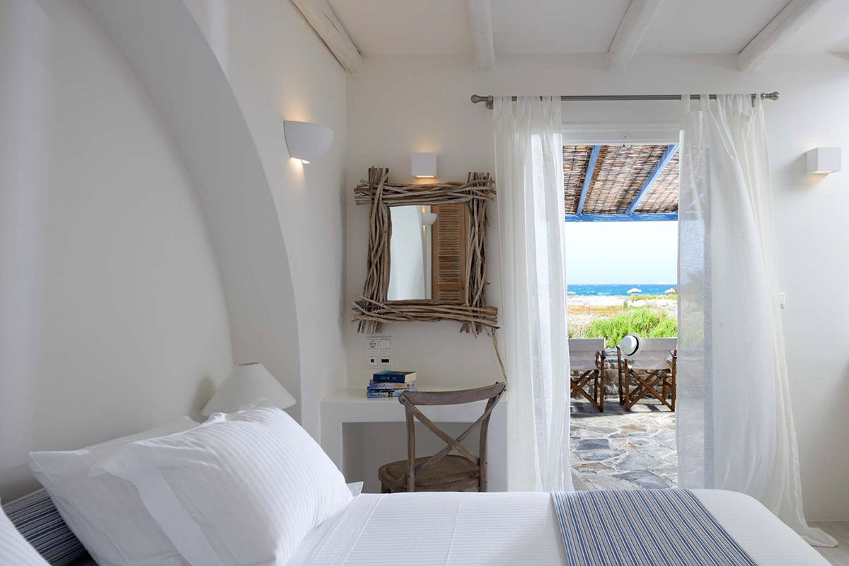 <b>Villa Marandi, Stelida</b> - With leafy beachfront gardens surrounding the property, Villa Marandi draws guests with its white-washed walls, beach loungers and parasols. Inspired by its surroundings, rooms are chic, airy, and have views of the Aegean. Step out onto an (almost) private beach and gaze across to the Old Town.