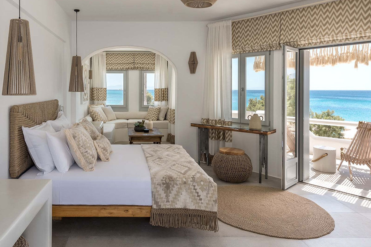 <b>Virtu Suites, Agios Prokopios</b> - Steps from the sand of Agios Prokopios Beach, the Virtu Suites is luxurious living with a relaxed bohemian style. The poolside bar and restaurant have woven umbrellas, and the hanging chairs provide ample views of the sea.