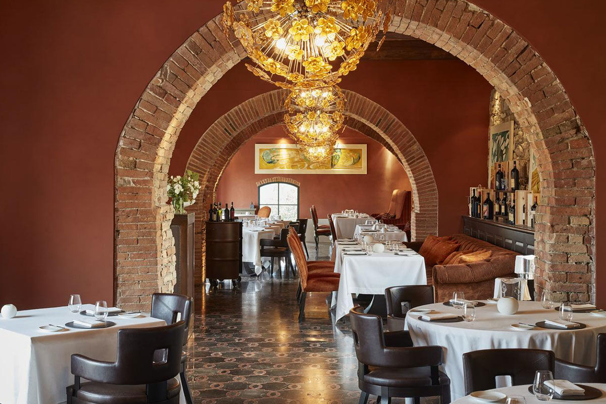 <b>Belmond Castello di Casole</b> - At this 10th century estate, wander the 4,200 acres of golden Tuscan countryside, relax in the wine cellar-turned-spacious spa or enjoy the valley-facing infinity pool. Surrounded by vineyards and olive groves, the Castello di Casole uses its panoramic views to inspire the rich traditional décor within.