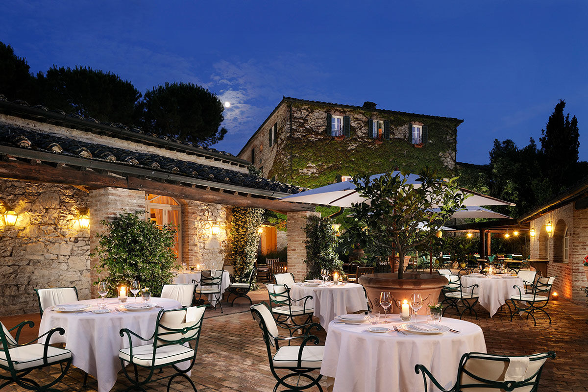 <b>Borgo San Felice</b> - Surrounded by vineyards and olive groves, Borgo San Felice is a restored 8th century building with stone walls, terracotta floors and exposed beams for your visual pleasure. This 5-star wine resort also features a piano bar with a fireplace, two restaurants, tennis courts, pool and sauna. Luxury and authenticity at its finest.