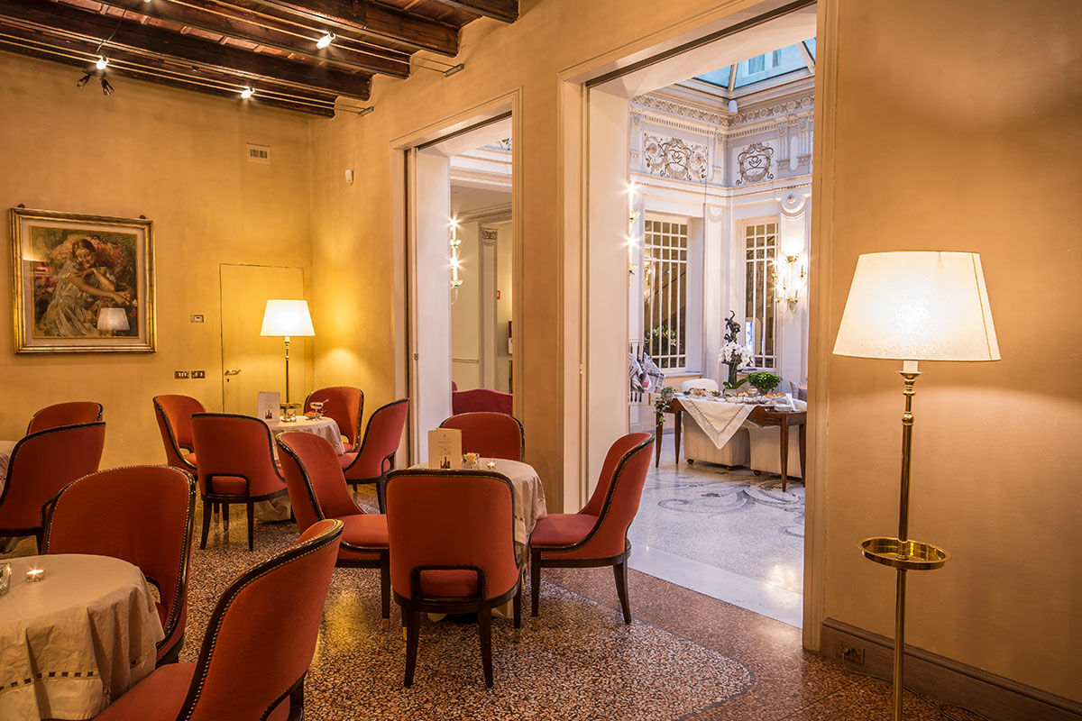 <b>Hotel Corona D'Oro, Bologna</b> - Housed in a 13th century redbrick building, this elegant hotel is a 3-minute walk from both St. Peter’s Cathedral and the medieval towers of Bologna. With its pillar-lined lounge and refined rooms, the Hotel Corona D’Oro takes this intimate property to a whole new level.