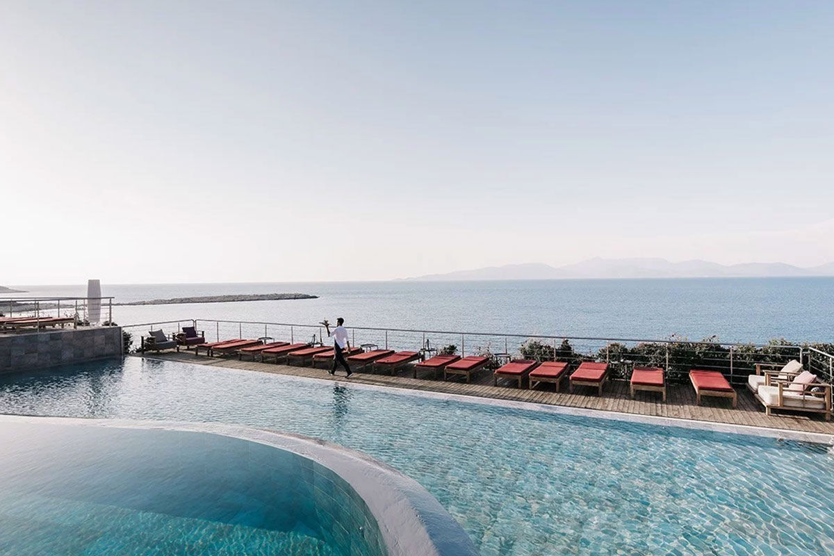 <b>Emelisse Art Hotel, Kefalonia</b> - With chunky teak furniture and neutral coloring, minimalist rooms in the Emelisse Art Hotel are charming, comfortable and have spanning sea views. The villas are nestled into landscaped grounds and feature tennis courts and swimming pools as well as an open-air cinema, and private rocky beach for guests to enjoy.