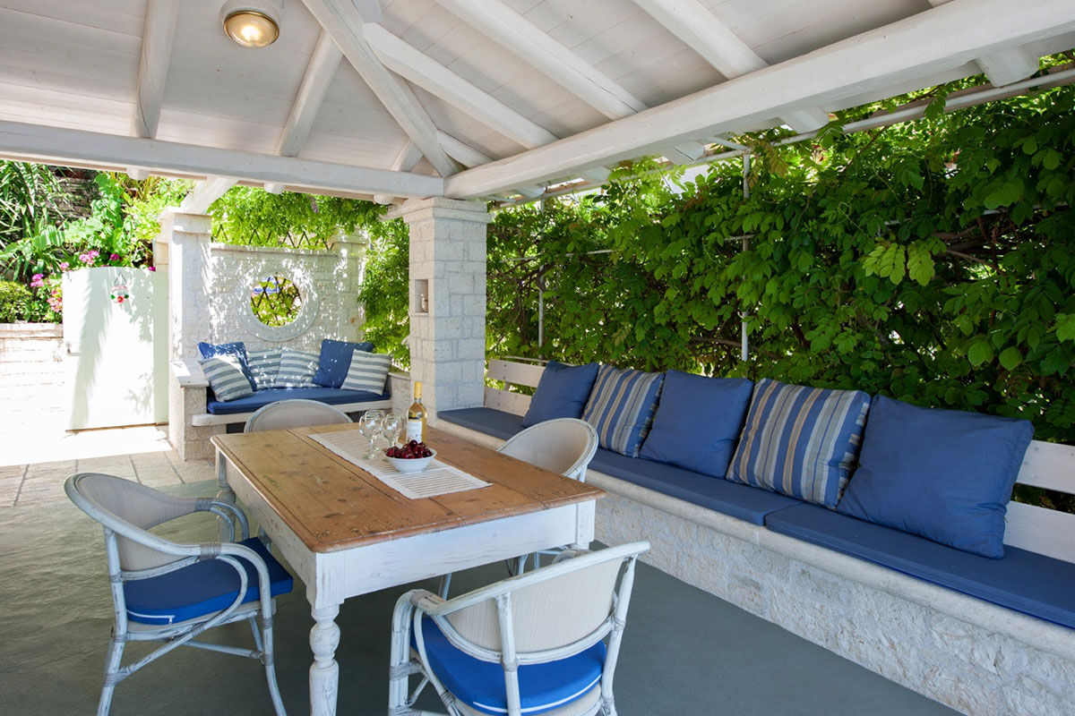 <b>Kaminaki Villas, Nissaki</b> - Conveniently located steps away from the pebble beach that bares the same name, the Kaminaki Villas have a cozy feel that welcomes guests upon arrival. This home-away-from-home has a terrace, pool and outdoor dining area where you can prepare a homemade meal for your family.