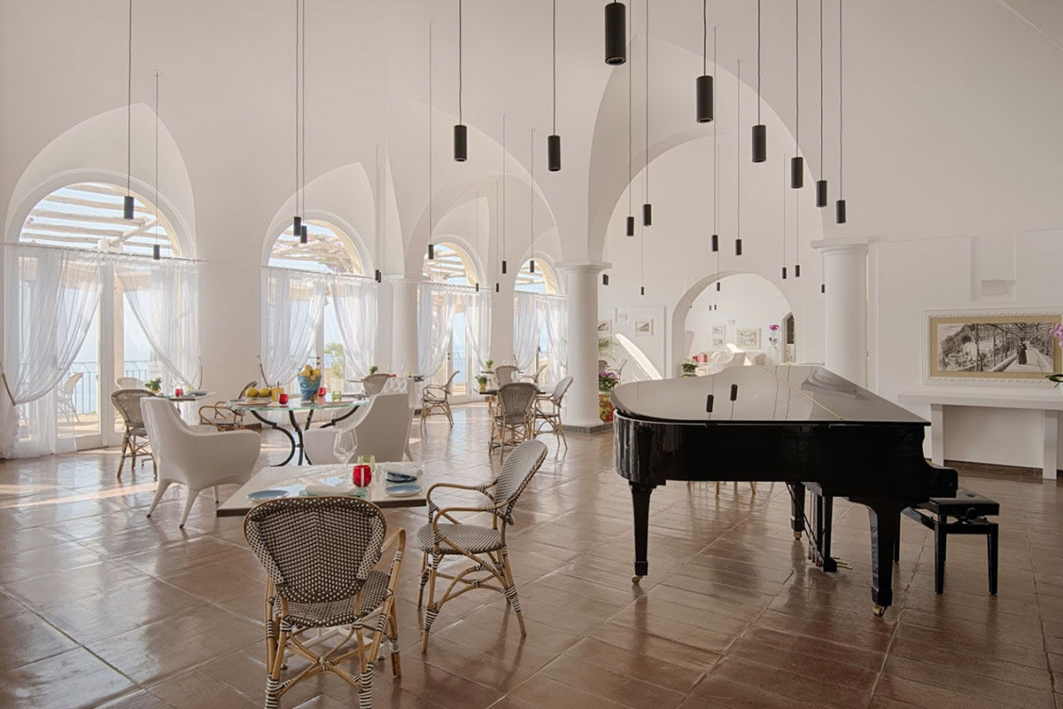 <b>NH Collection Grand Hotel Convento di Amalfi, Amalfi</b> - Once home to Capuchin monks, this 13th century monastery has been restored into a 5-star hotel with polished rooms and views of the coast. Two posh restaurants with al fresco dining, a wellness center, an infinity pool and authentic artworks throughout the property add to the feeling of Mediterranean refinement.