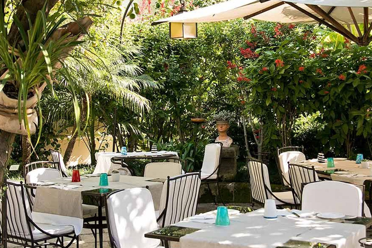 <b>Palazzo Murat, Positano</b> - A patrician residence with a secret garden to explore, this 18th century palazzo serves as an oasis right in the center of Positano. Palazzo Murat has a certain glamorous charm with its shaded terraces, canvas parasols, and sun loungers by the pool.