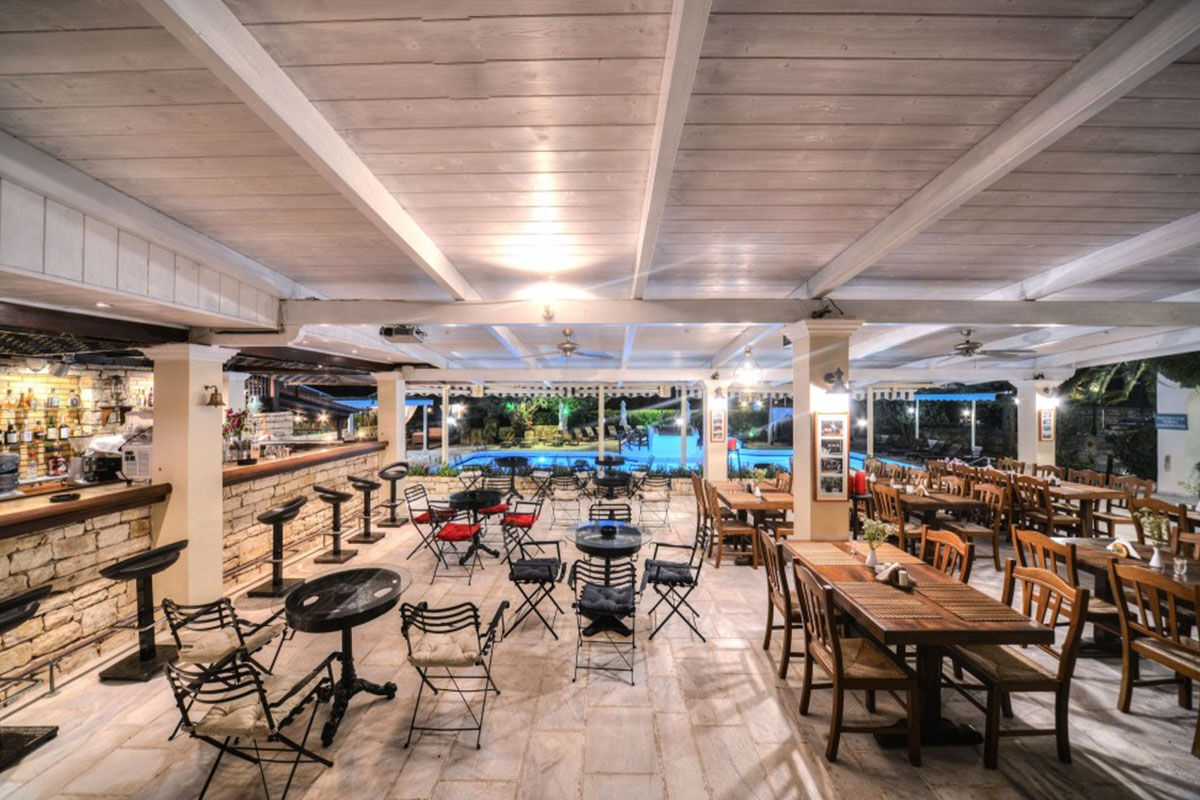 <b>Paxos Club Resort & Spa, Gaios</b> - Only a 15-minute walk to both the lively town and the ancient Cistern of Gaios, the Paxos Club Resort & Spa is conveniently located while remaining secluded and hidden by lush greenery. The rooms are simple and homey, the restaurant has an old-world feel with its stone wall and wooden beamed ceilings, and the pool has sun loungers with parasols.