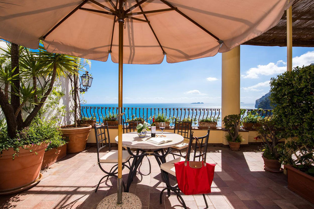 <b>Albergo California, Positano</b> - The views of the pastel-dotted cliffs from this Mediterranean-style boutique hotel are only enhanced when they’re accompanied by breakfast on the terrace overlooking the sea. Albergo California is set up on the hillside and is only a 9-minute walk to the beach.