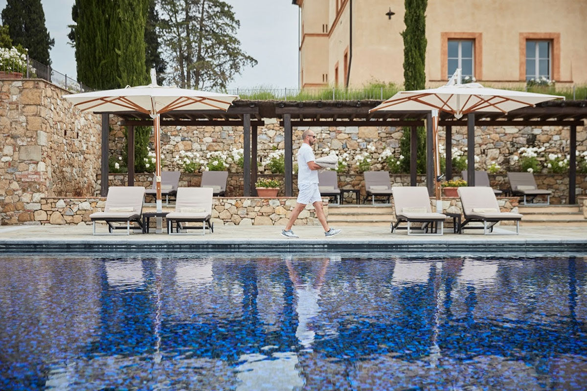 <b>Belmond Castello di Casole</b> - At this 10th century estate, wander the 4,200 acres of golden Tuscan countryside, relax in the wine cellar-turned-spacious spa or enjoy the valley-facing infinity pool. Surrounded by vineyards and olive groves, the Castello di Casole uses its panoramic views to inspire the rich traditional décor within.