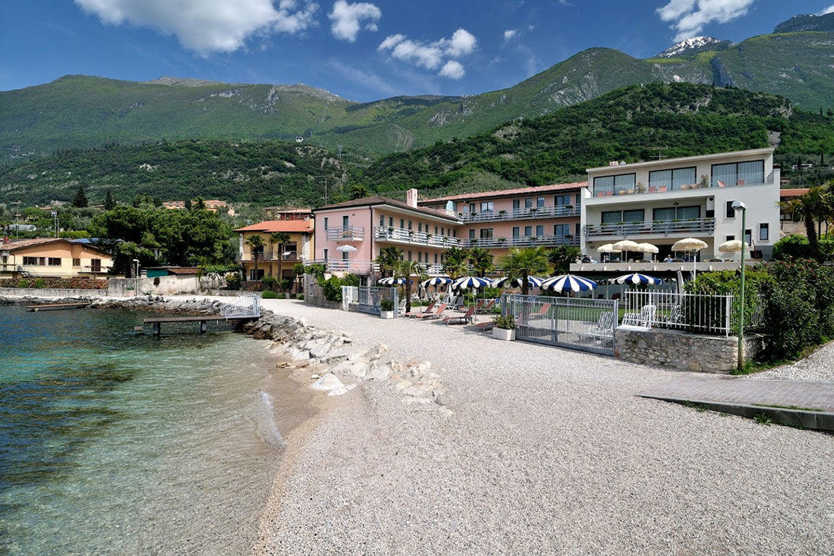 <b>Castello - Lake Front Hotel & Living Suites, Malcesine</b> - On the shores of Lake Garda, Hotel Castello is the perfect place to relax under a parasol on the private beach or dine on the lakefront terrace restaurant. It has an airy charm and is within walking distance of the historical alleyways downtown.