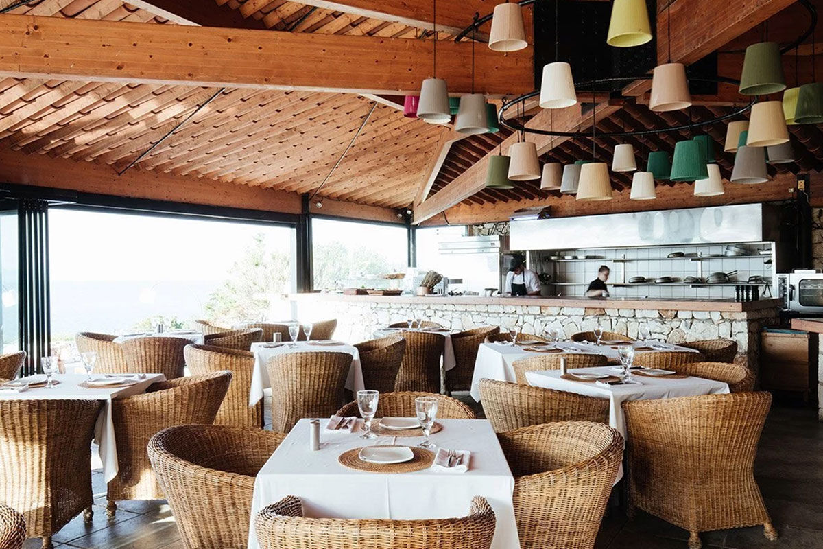 <b>Emelisse Art Hotel, Kefalonia</b> - With chunky teak furniture and neutral coloring, minimalist rooms in the Emelisse Art Hotel are charming, comfortable and have spanning sea views. The villas are nestled into landscaped grounds and feature tennis courts and swimming pools as well as an open-air cinema, and private rocky beach for guests to enjoy.