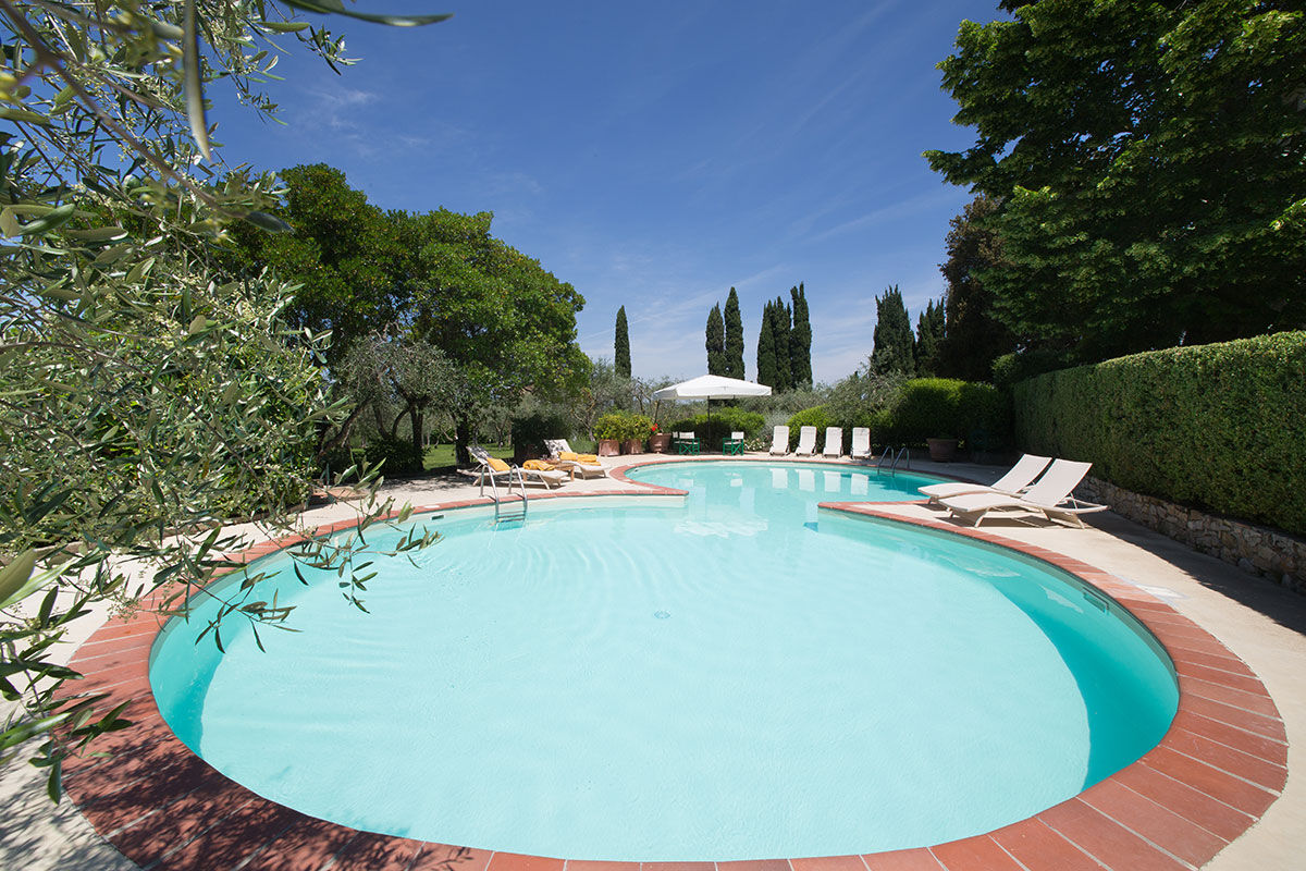 <b>La Canonica di Cortine</b> - Within the heart of Chianti, set amidst centuries-old vineyards and olive trees, La Canonica di Cortine is an ancient abode for country-chic lovers. With mature gardens, a pool and shaded terrace, this Chianti villa is the dream holiday retreat.
