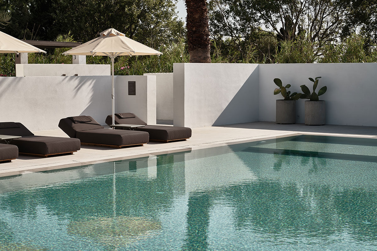 <b>Parilio, Naoussa</b> - With smooth architectural lines, warm minimalist décor and cacti planted throughout the property, Parilio is a 33-suite retreat inspired by Paros’s landscape and culture. Guests can explore the secluded, pine-fringed coves or nearby white-washed fishing villages for the slow rhythms of Cycladic life.