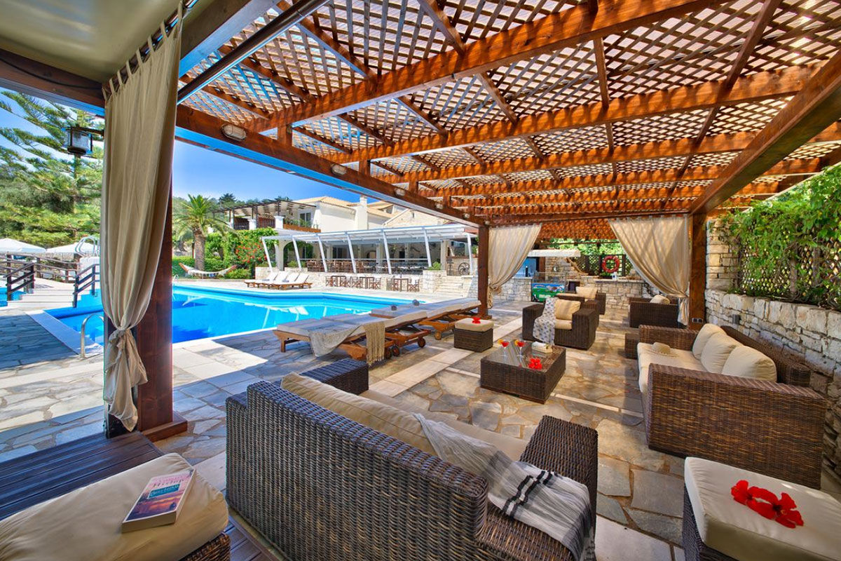 <b>Paxos Club Resort & Spa, Gaios</b> - Only a 15-minute walk to both the lively town and the ancient Cistern of Gaios, the Paxos Club Resort & Spa is conveniently located while remaining secluded and hidden by lush greenery. The rooms are simple and homey, the restaurant has an old-world feel with its stone wall and wooden beamed ceilings, and the pool has sun loungers with parasols.