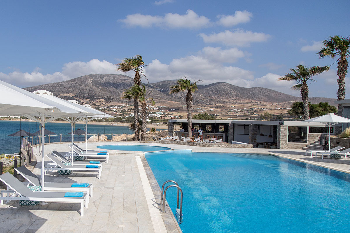 <b>Poseidon of Paros, Golden Beach</b> - Tucked away from busy areas, this upscale hotel on Paros’ southern coast is a dream retreat for the serenity-seeking traveler. With poolside bars and the striking architecture of the Cyclades, this Golden Beach hotel sits on unspoiled beauty.