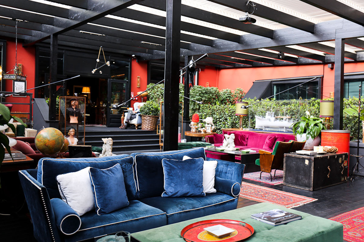 <b>The Yard</b> - Overlooking the canal, this funky, moody hotel invites you to grab a cocktail at its retro bar or recline into a leather couch in its stylish lounge. Filled with antiques and unique items, The Yard sparks inspiration before you head out into Milan’s nightlife.