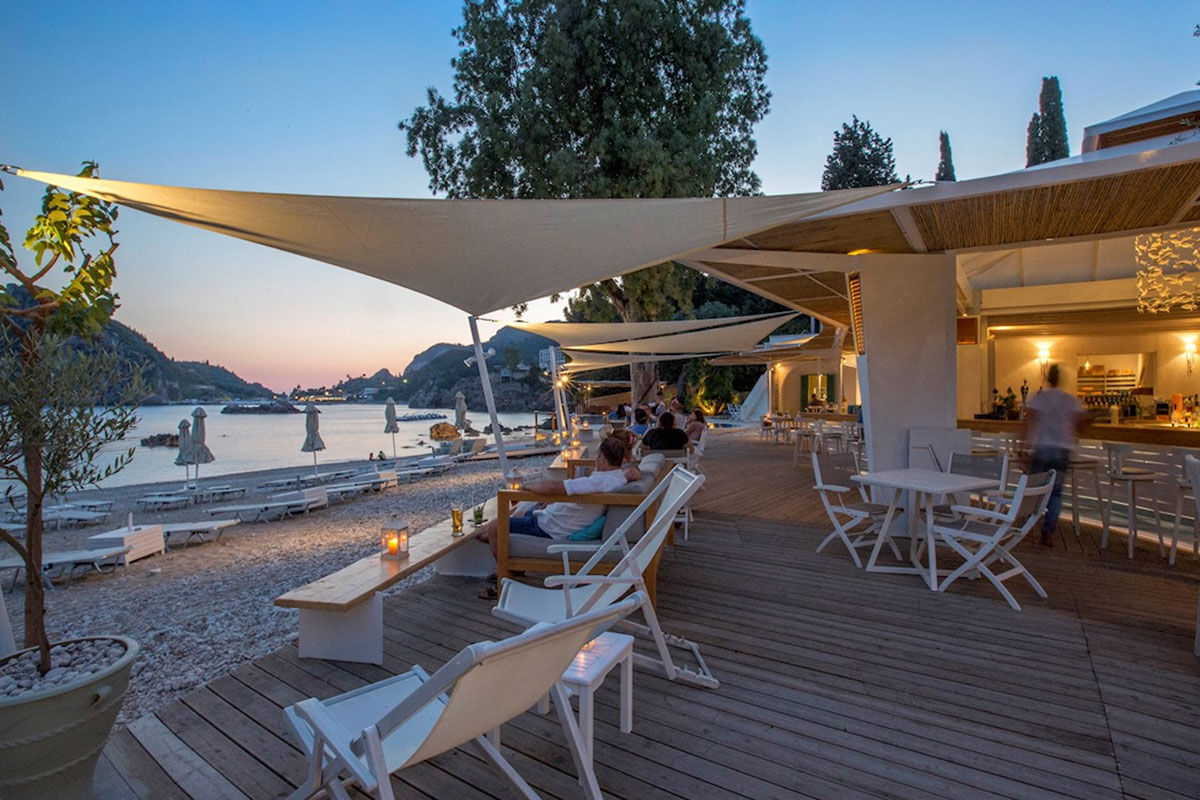 <b>Akrotiri Beach, Paleokastritsa</b> - Nestled into the cliff on the edge of the Alipa Marina, Akrotiri Beach Hotel hums with activity: guests relax at the sun terrace bar, swim in the infinity pool and pack their bathing suits for a trip to Agia Triada Beach.