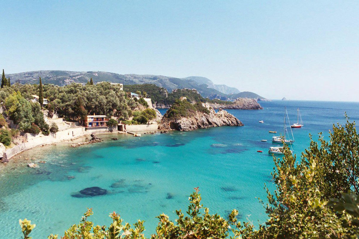 <b>Kaminaki Villas, Nissaki</b> - Conveniently located steps away from the pebble beach that bares the same name, the Kaminaki Villas have a cozy feel that welcomes guests upon arrival. This home-away-from-home has a terrace, pool and outdoor dining area where you can prepare a homemade meal for your family.