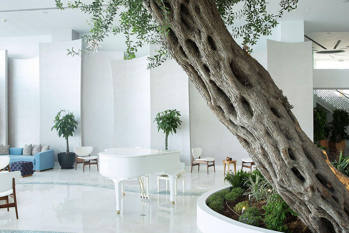 <b>Domes Miramare, a Luxury Collection Resort, Moraitika</b> - Walk along the private white sand beach before heading to the Blue Bar for some pre-dinner drinks at this refined adult-only resort. After that, head over to the raw bar or take a sunset dip in the infinity pool before retreating to your classic upscale room with a view.