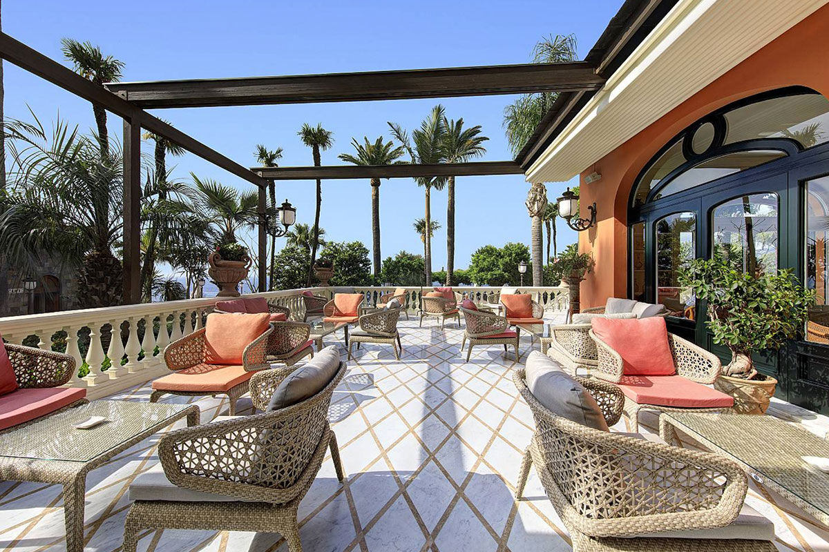 <b>Grand Hotel Royal, Sorrento</b> - Featuring a private beach on site, the Grand Hotel Royal is an elegant estate overlooking the Gulf of Naples from its perch on a cliff. Wander through the palm-filled gardens and smell the citrus trees at sunset before retreating to your suite which features contemporary-classic furnishings.