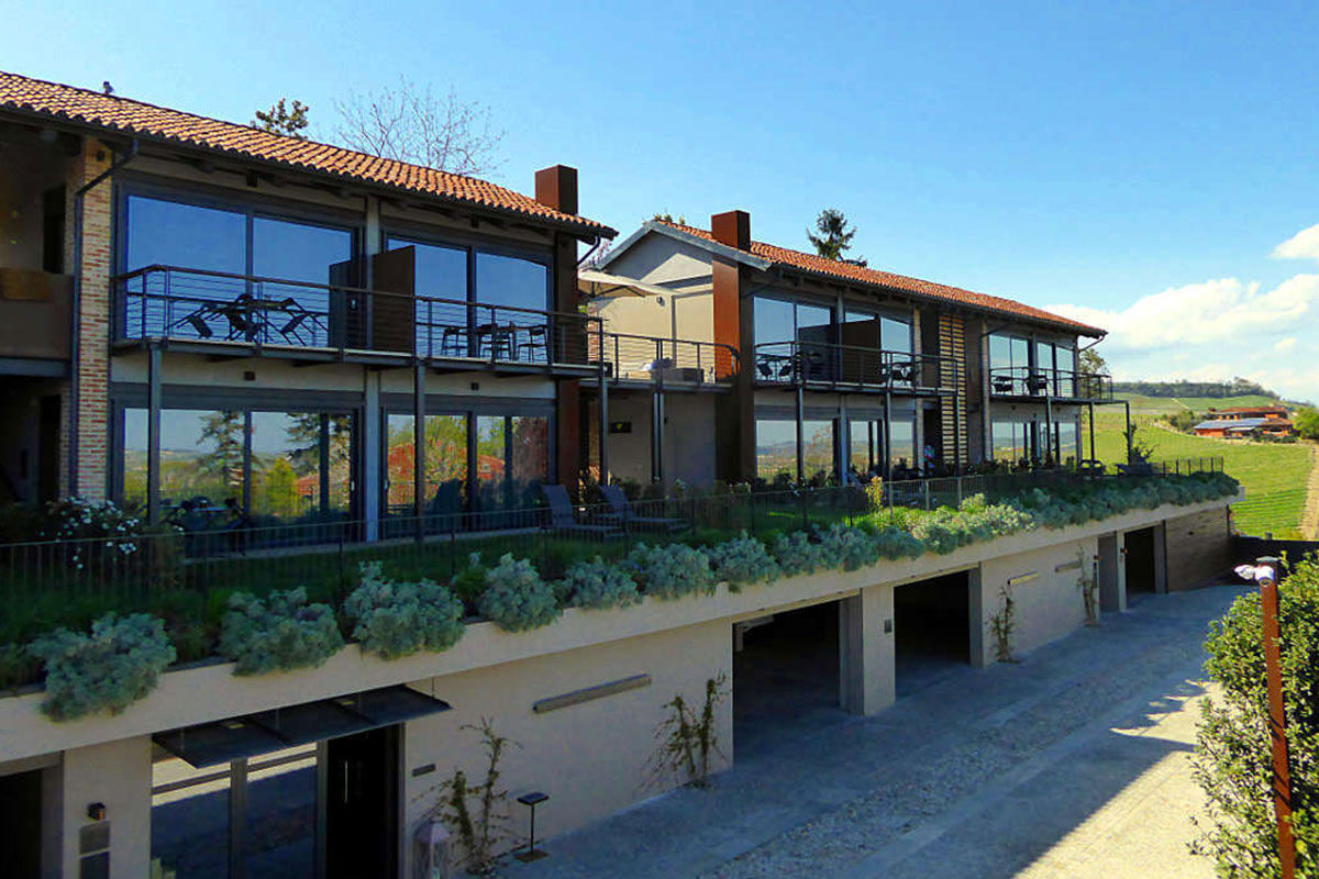 <b>Arborina Relais</b> - Surrounded by Barolo hill vineyards and sitting atop lush grounds, the Arborina Relais is a modern boutique hotel that offers luxury and style. The architectural lines, large windows and natural materials make it an experience hand in hand with nature.