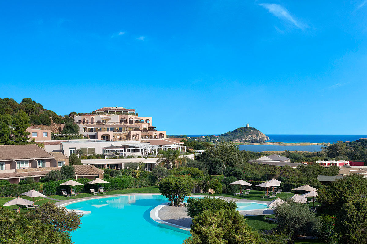 <b>Chia Laguna</b> - Located in the southern Cagliari province, the Chia Laguna consists of 3 hotels — all of which are a testament to Italian hospitality. With untouched natural beauty, this resort offers unadulterated views of the ocean and lagoon (which is home to pink flamingos)!