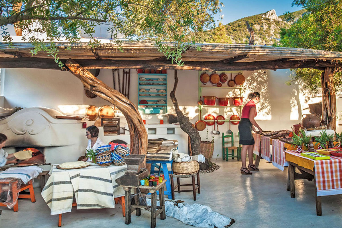 <b>Experience Hotel Su Gologone</b> - Hotel Su Gologone is the perfect escape for those who appreciate local art, food, wine and culture. Surrounded by the Supramonte mountaintops, this hotel has stunning sunset views; it hosts expert artists teaching classes on site, and showcases the bright colors and textiles of regional Sardinian crafts.