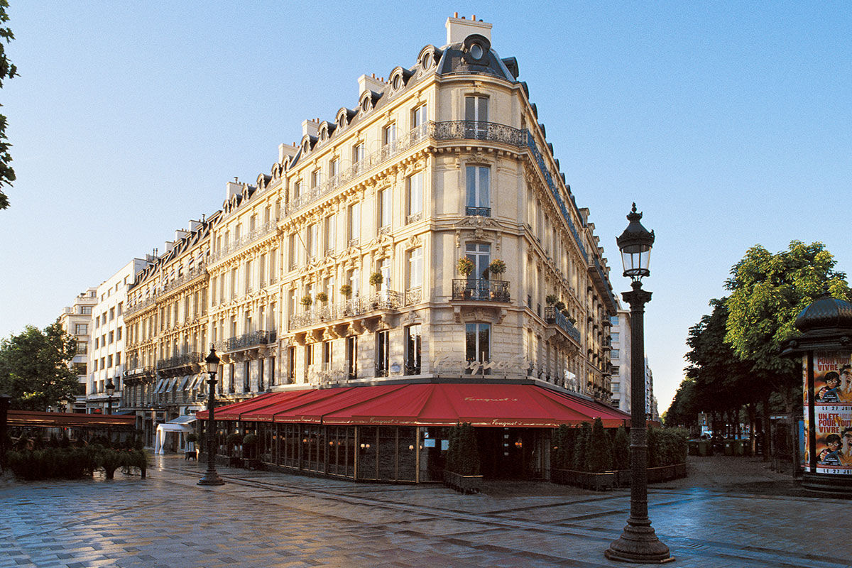 <b>Hotel Barriere Le Fouquet’s</b> - Only a 2-minute walk from the Avenue des Champs-Elysees, this upscale and moody hotel is set in a grand Napoleon III building, beckoning all who walk by. The curtains are velvet and silk, the pool features dark, stately pillars, and the luxurious rooms show off their mahogany woodwork and precious leathers.